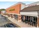 A bustling shopping center with various businesses, including a beauty supply store and breakfast bar at 2261 Venetian Dr, Atlanta, GA 30311