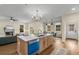Spacious kitchen with large center island, modern appliances, and hardwood floors at 2261 Venetian Dr, Atlanta, GA 30311