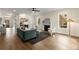 Bright living room features fireplace, hardwood floors, and an open floor plan at 2261 Venetian Dr, Atlanta, GA 30311