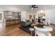 Open-concept living room and kitchen with hardwood floors and modern decor at 2261 Venetian Dr, Atlanta, GA 30311