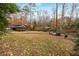 A tranquil park grounds features a picnic shelter and stone bench with seating at 2261 Venetian Dr, Atlanta, GA 30311