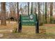 A welcoming sign for Adams Park, showcasing its inviting entrance with decorative planters at 2261 Venetian Dr, Atlanta, GA 30311
