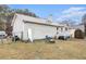 View of the rear exterior of the home showing the siding and the backyard at 160 Wesley Chapel Rd, Villa Rica, GA 30180