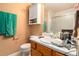Functional bathroom featuring a single sink vanity, a toilet, and a shower with sliding glass doors at 160 Wesley Chapel Rd, Villa Rica, GA 30180