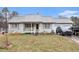 Charming single-story home with a welcoming front porch and attached two-car garage at 160 Wesley Chapel Rd, Villa Rica, GA 30180