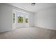 Bright bedroom with a bay window offering natural light and peaceful views at 201 Retreat Ln, Canton, GA 30114