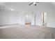 Bright bedroom with neutral carpet, walk-in closet, and ensuite bathroom access at 201 Retreat Ln, Canton, GA 30114
