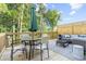 Outdoor deck with seating, umbrella, and wooded views at 201 Retreat Ln, Canton, GA 30114