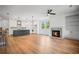 Open floor plan featuring hardwood floors, fireplace, and spacious kitchen with center island at 201 Retreat Ln, Canton, GA 30114