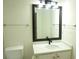 Bright bathroom featuring a vanity with stone countertop, modern fixtures, and toilet at 735 Sunset Ridge Ln, Lawrenceville, GA 30045