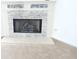 Close up on the fireplace featuring stacked stone and a tile accent at 735 Sunset Ridge Ln, Lawrenceville, GA 30045