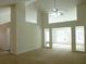 Spacious living room with neutral carpet, high ceilings and abundant natural light at 735 Sunset Ridge Ln, Lawrenceville, GA 30045