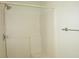 An enclosed shower with a shower head and towel rack at 735 Sunset Ridge Ln, Lawrenceville, GA 30045