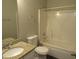 Full bathroom with granite countertops, combination shower and tub, and stylish fixtures at 4423 Gladewood Run, Union City, GA 30291