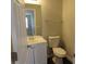 Cozy half-bathroom with modern vanity and neutral paint at 4423 Gladewood Run, Union City, GA 30291