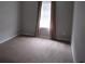 Bedroom with wall-to-wall carpeting and neutral-colored walls at 4423 Gladewood Run, Union City, GA 30291