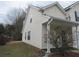 Charming home featuring a quaint, covered entryway and neutral-colored siding at 4423 Gladewood Run, Union City, GA 30291