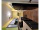 The kitchen features tiled countertops, updated appliances, and ample cabinet space at 5820 Par Four Ct, Lithonia, GA 30038