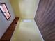Angled view of Living Room with laminate floors and yellow walls at 5820 Par Four Ct, Lithonia, GA 30038