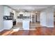 Bright, updated kitchen features a center island and opens to a living area at 127 Holly St, Social Circle, GA 30025