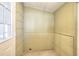 Small mudroom featuring neutral colored walls and floors with a door at 127 Holly St, Social Circle, GA 30025