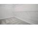Walk-in closet with carpet flooring and white wire shelving at 203 Retreat Ln, Canton, GA 30114