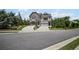 Beautiful townhome on a corner lot, with a lovely yard and long driveway at 203 Retreat Ln, Canton, GA 30114