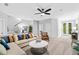 Large living room with comfortable seating, natural light, and open layout at 203 Retreat Ln, Canton, GA 30114
