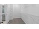 Functional walk-in closet with ample shelving and storage solutions at 203 Retreat Ln, Canton, GA 30114
