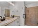 Bathroom features a tiled shower, dual sink vanity, and a modern color scheme at 310 Mcdonough Se Blvd # 104, Atlanta, GA 30315