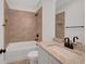 Bathroom with a shower-tub combo, granite countertop, sink, mirror and tiled floor at 310 Mcdonough Se Blvd # 104, Atlanta, GA 30315