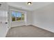 Bedroom with a large window, spacious closet, and neutral-toned walls at 310 Mcdonough Se Blvd # 104, Atlanta, GA 30315