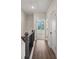 Hallway featuring hardwood floors and access to other rooms at 310 Mcdonough Se Blvd # 104, Atlanta, GA 30315