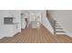 Open-concept living room and kitchen with stainless appliances and an island at 310 Mcdonough Se Blvd # 104, Atlanta, GA 30315