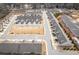 An aerial view of new townhomes in a meticulously planned community at 2101 Slick Stone Dr, Snellville, GA 30078