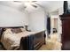 Comfortable bedroom features hardwood floors, ceiling fan, and access to closet and bathroom at 2057 Bixler Cir, Decatur, GA 30032