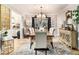 Traditional dining room showcases a chandelier, decorative rug, and bright light at 2057 Bixler Cir, Decatur, GA 30032