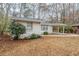 A cozy home with a well-kept lawn and landscaped front yard at 3511 Misty Valley Rd, Decatur, GA 30032