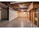 Spacious unfinished basement with white walls and concrete floor at 3527 Glenview Sw Cir, Atlanta, GA 30331