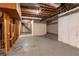 Unfinished basement with concrete floors and stairs to upstairs at 3527 Glenview Sw Cir, Atlanta, GA 30331