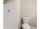 Bathroom with white tiled shower and standard toilet at 3527 Glenview Sw Cir, Atlanta, GA 30331