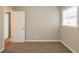 Bedroom with neutral walls, plush carpet, and a closet at 3527 Glenview Sw Cir, Atlanta, GA 30331