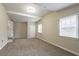 Neutral bedroom featuring plush carpeting and natural light from two windows at 3527 Glenview Sw Cir, Atlanta, GA 30331