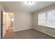 Bedroom with plush carpeting and natural light from window at 3527 Glenview Sw Cir, Atlanta, GA 30331