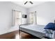 Cozy bedroom featuring natural light, wooden floors, and soft colors at 569 Hope Sw St, Atlanta, GA 30310