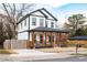 Beautiful two-story home boasts a covered front porch with a spacious driveway at 569 Hope Sw St, Atlanta, GA 30310