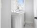 Convenient laundry room with modern washer and dryer units at 569 Hope Sw St, Atlanta, GA 30310