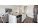 Modern kitchen featuring a granite island, stainless steel appliances, and open layout for entertaining at 815 Taurus Dr, Stockbridge, GA 30281