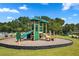 Community playground with a slide and climbing structure, ideal for Gathering fun and outdoor activities at 815 Taurus Dr, Stockbridge, GA 30281