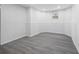 Basement featuring clean walls, flooring and baseboards with a small window at 130 Brookridge Ct, Fayetteville, GA 30215